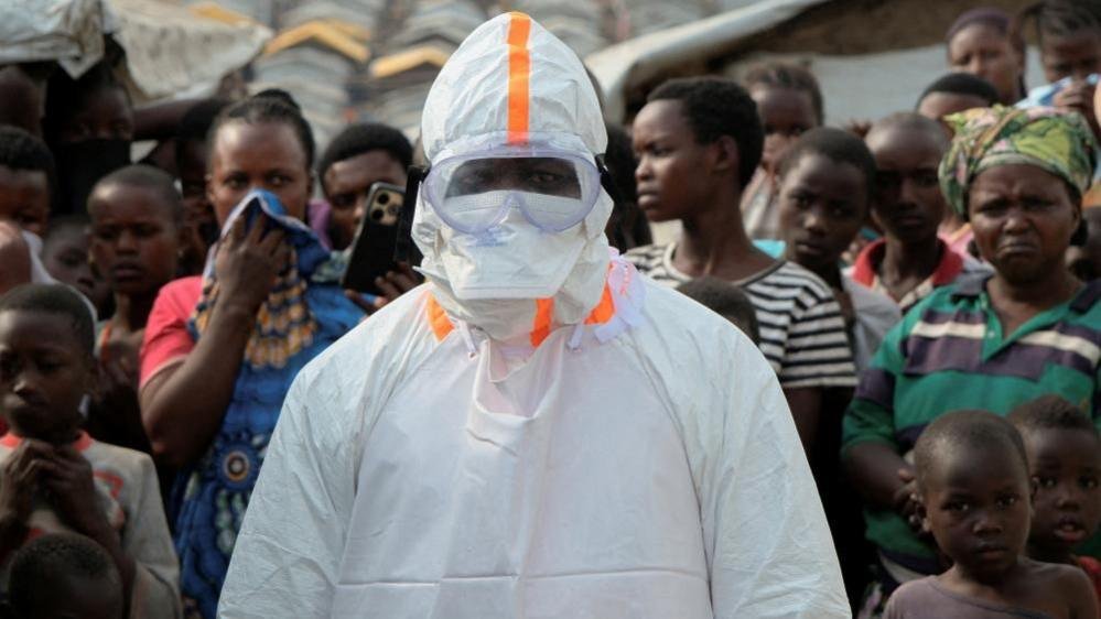 First person gets new experimental vaccine for Ebola