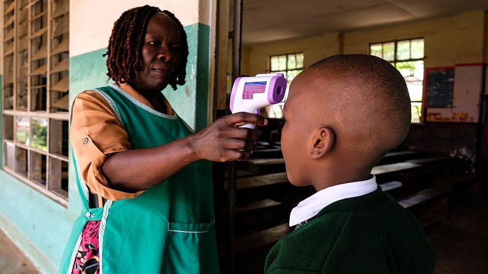 First person gets new experimental vaccine for Ebola